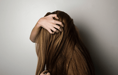 woman hair combing